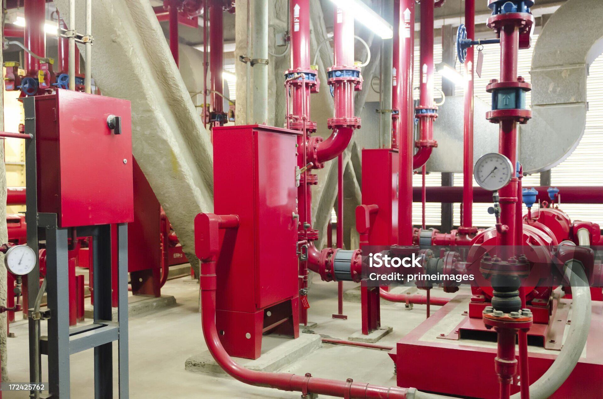 Red-coded fire pump set in plant room